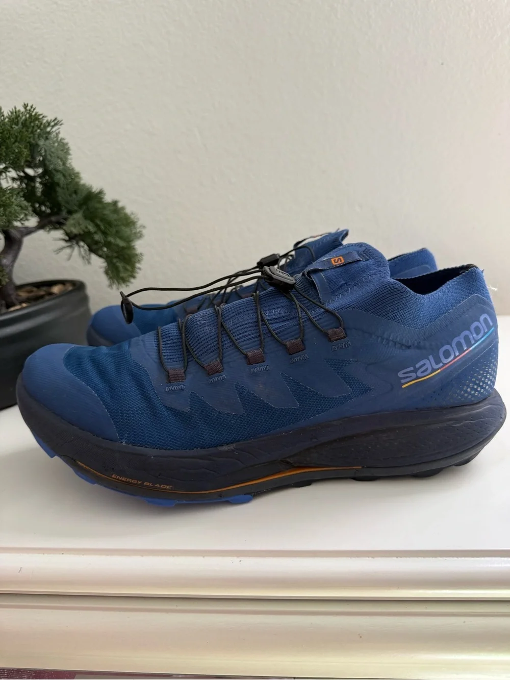 Salomon pulsar trail pro Men size 10.5 Blue Trail Runner with Orange Accents